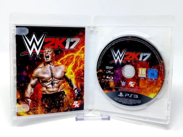 Interior del juego WWE 2K17 (ESP) para PlayStation 3 con disco y manual