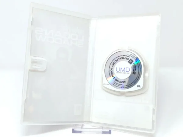 Interior del juego Syphon Filter: Logan's Shadow (ESP) (Promo) para PSP con disco y manual