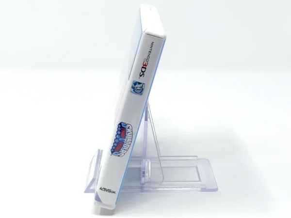 Interior del juego Skylanders Trap Team (ESP) para Nintendo 3DS con disco y manual