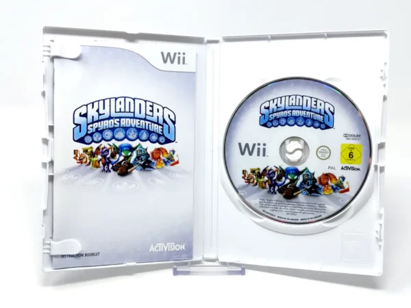Interior del juego Skylanders Spyro's Adventure (ESP) para Nintendo Wii con disco y manual