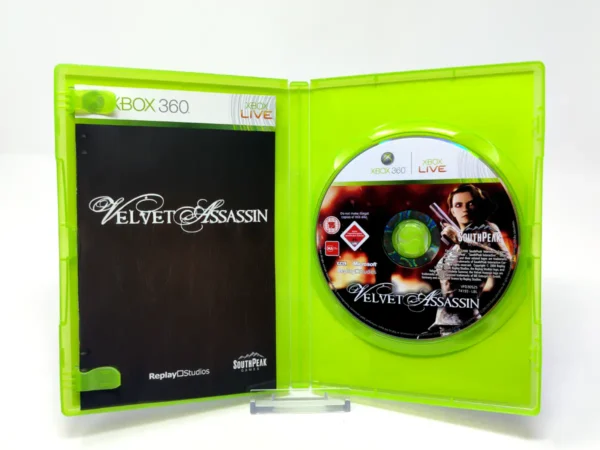 Interior del juego Velvet Assassin (ESP) para XBOX 360 con disco y manual