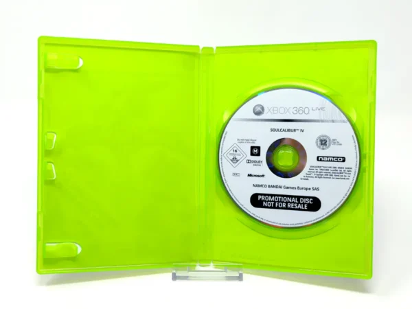 Interior del juego SoulCalibur IV (EUR) (Promo) para XBOX 360 con disco y manual
