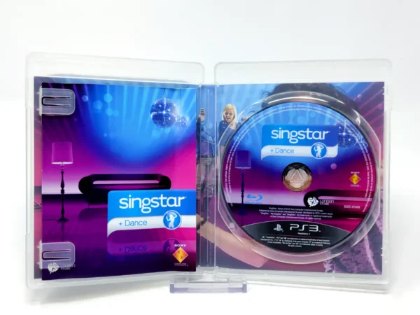 Interior del juego SingStar Dance (ESP) para PlayStation 3 con disco y manual
