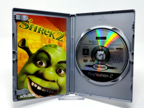 Interior del juego Shrek 2 (Platinum) (ESP) para PlayStation 2 con disco y manual