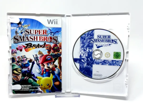 Interior del juego Super Smash Bros. Brawl (ESP) (Selects) para Nintendo Wii con disco y manual