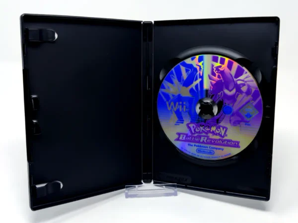 Interior del juego Pokémon Battle Revolution (ESP) (Rebajado) para Nintendo Wii con disco y manual