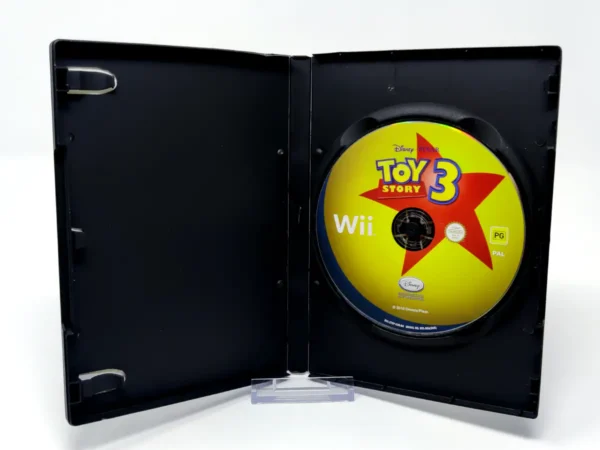 Interior del juego Disney•Pixar Toy Story 3: The Video Game (ESP) (Rebajado) para Nintendo Wii con disco y manual