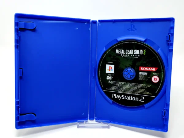 Interior del juego Metal Gear Solid 3: Snake Eater (HOL) (Rebajado) para PlayStation 2 con disco y manual