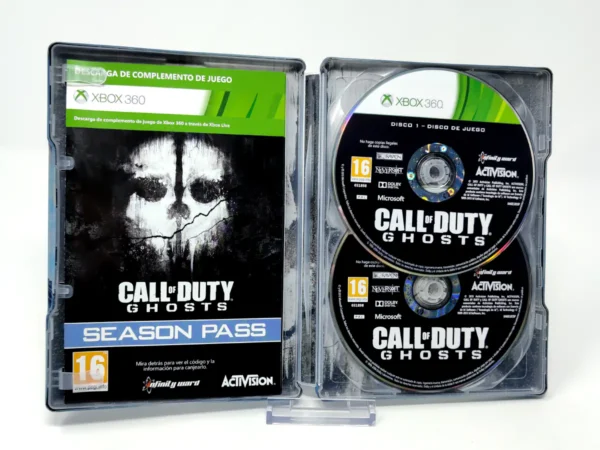 Interior del juego Call of Duty: Ghosts (ESP) (Steelbook) para XBOX 360 con disco y manual