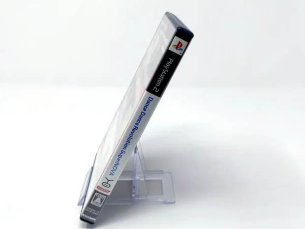 Interior del juego Dance Dance Revolution SuperNova (JAP) para PlayStation 2 con disco y manual