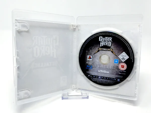 Interior del juego Guitar Hero: Metallica (ESP) (Rebajado) para PlayStation 3 con disco y manual