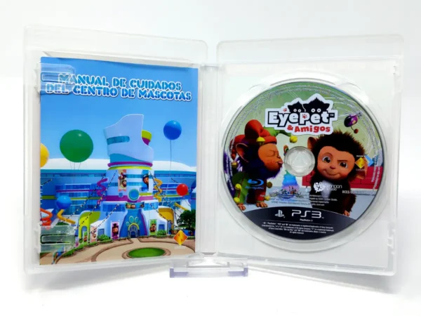 Interior del juego EyePet y sus Amigos (ESP) (Essentials) para PlayStation 3 con disco y manual