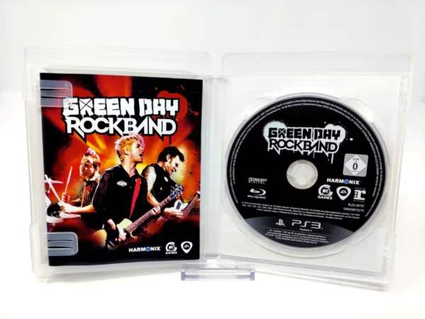 Interior del juego Green Day: Rock Band (ESP) para PlayStation 3 con disco y manual