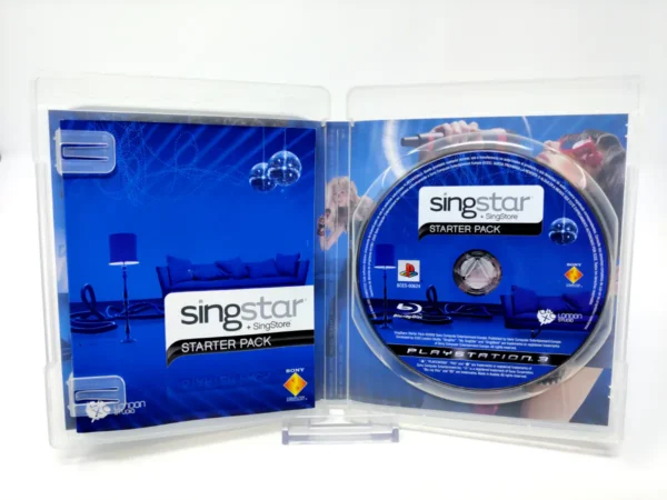Interior del juego SingStar: Starter Pack (ESP) para PlayStation 3 con disco y manual