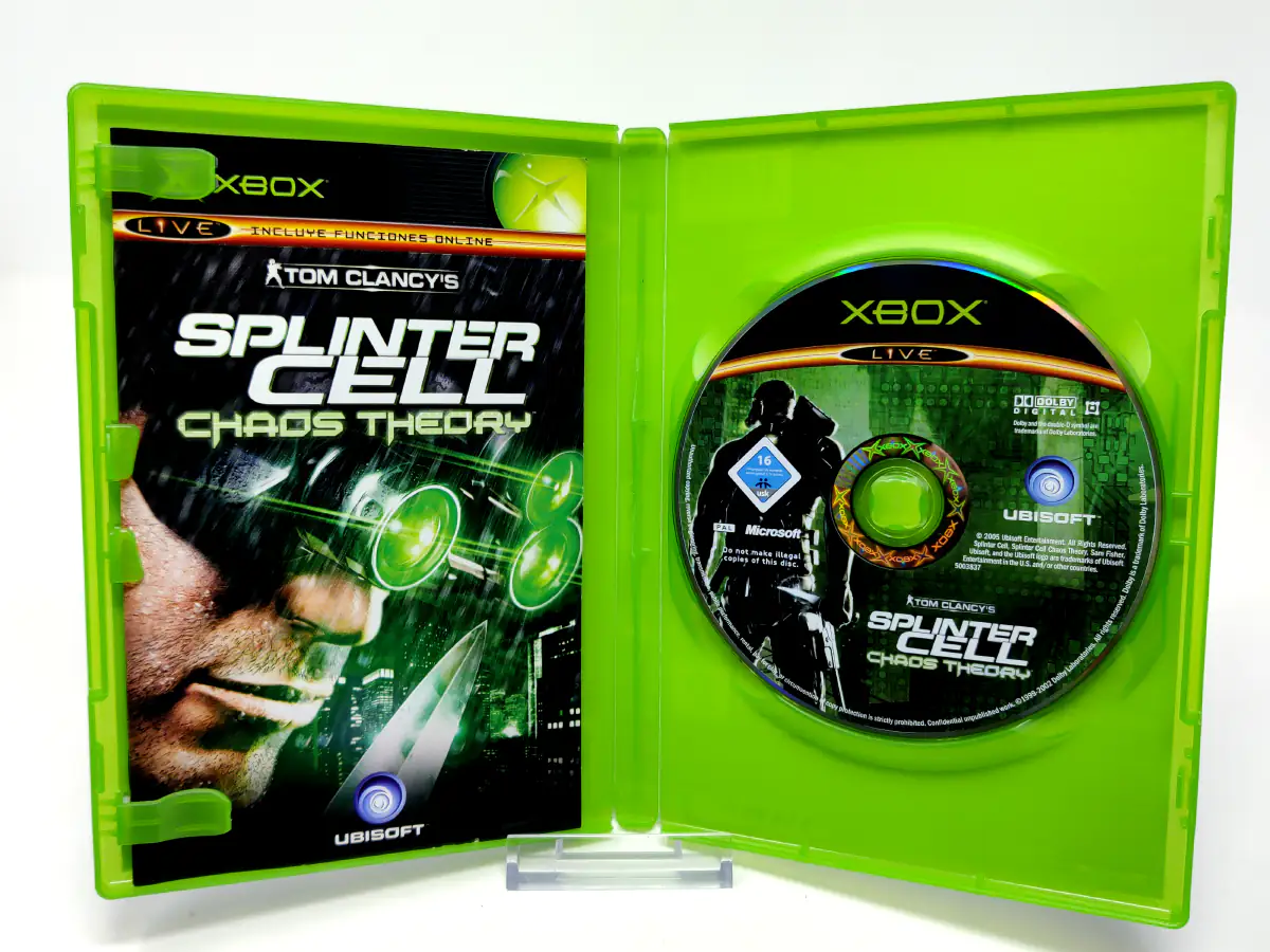 Interior del juego Tom Clancy's Splinter Cell Chaos Theory (ESP) para XBOX con disco y manual