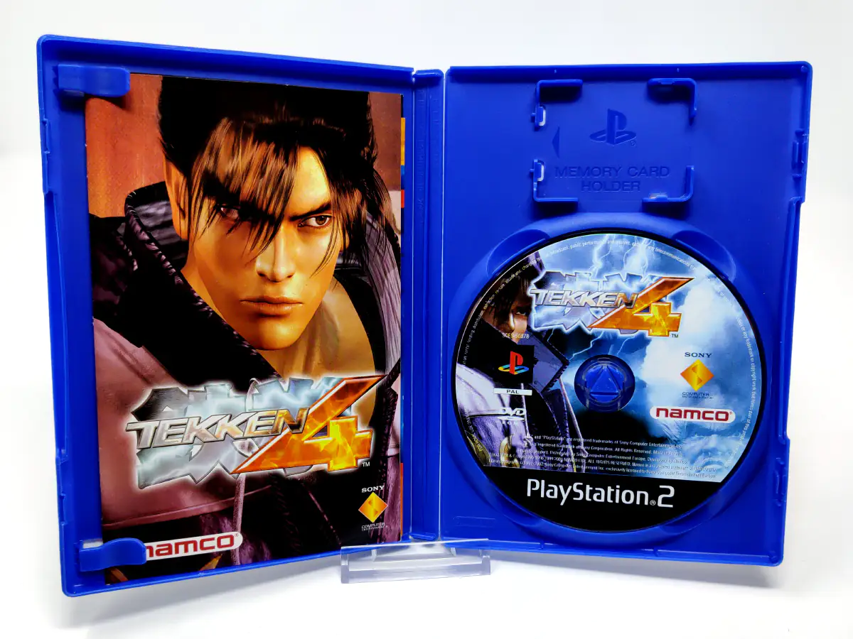 Interior del juego Tekken 4 (ESP) para PlayStation 2 con disco y manual