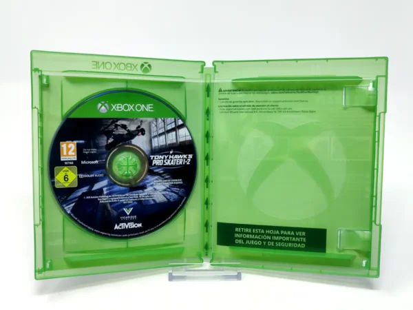 Interior del juego Tony Hawk's Pro Skater 1 + 2 (ESP) para XBOX One / Series X/S con disco y manual