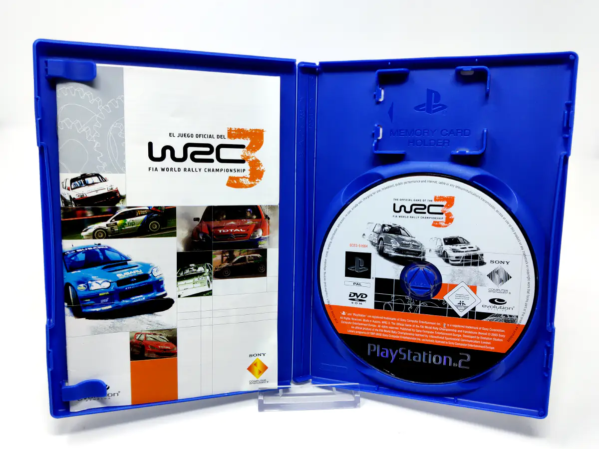 Interior del juego WRC 3: El Juego Oficial del FIA World Rally Championship (ESP) para PlayStation 2 con disco y manual