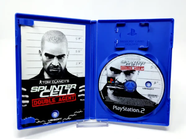 Interior del juego Tom Clancy's Splinter Cell Double Agent (ESP) para PlayStation 2 con disco y manual