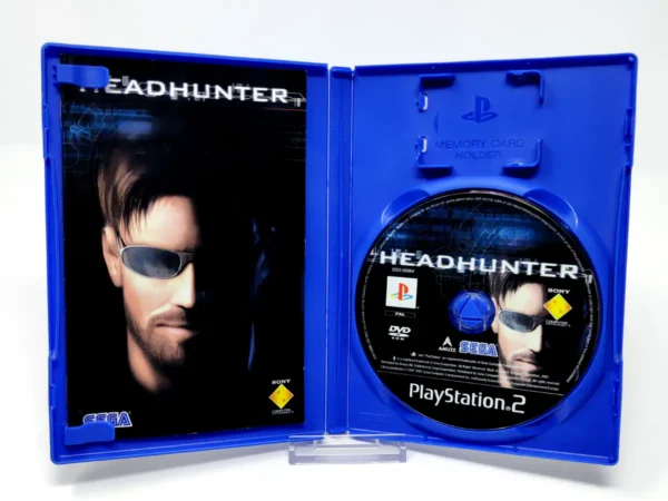 Interior del juego Headhunter (ESP) para PlayStation 2 con disco y manual