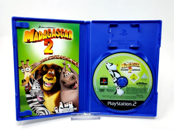 Interior del juego Madagascar 2 (ESP) para PlayStation 2 con disco y manual