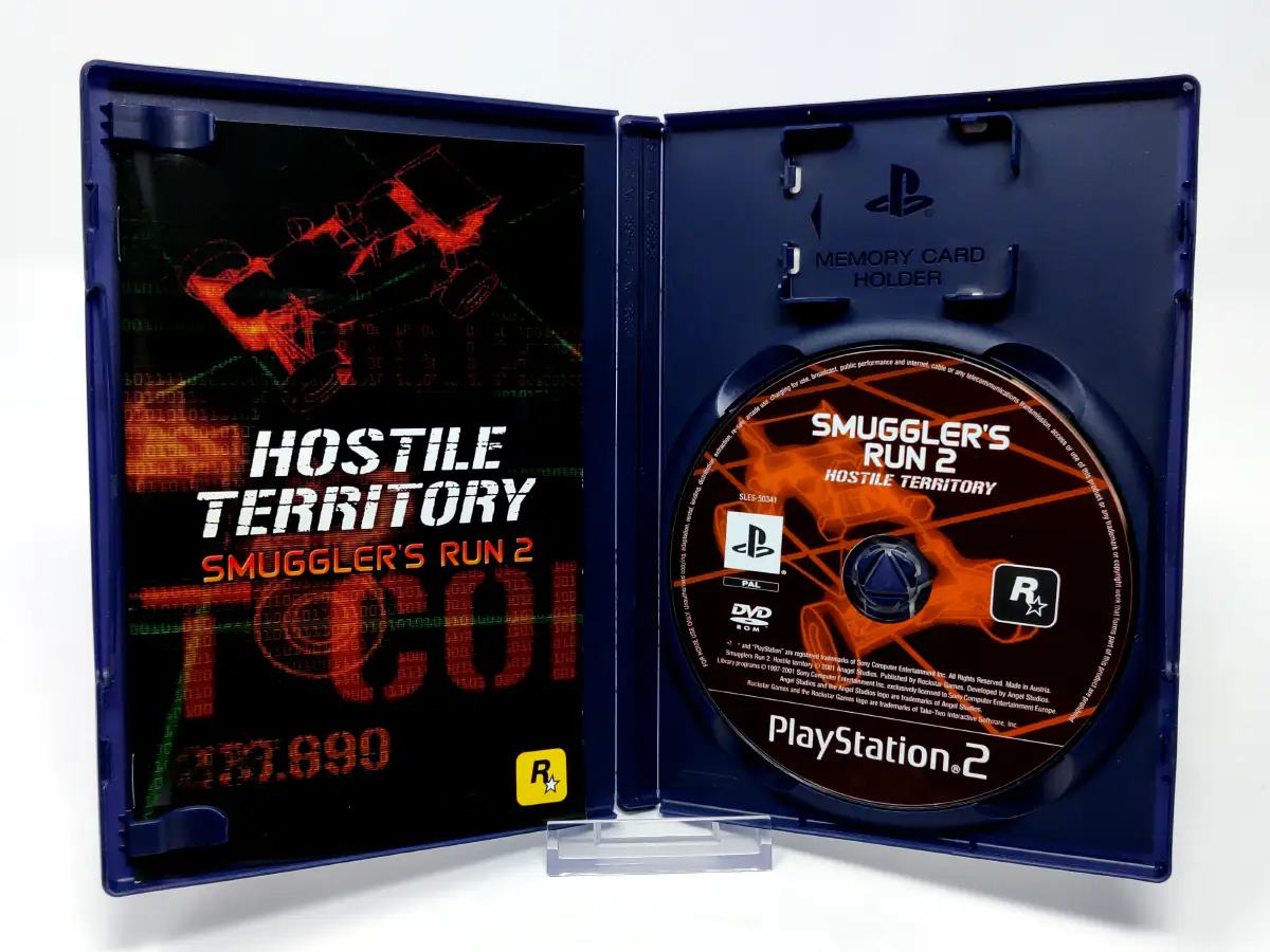 Interior del juego Smuggler's Run 2 (ESP) para PlayStation 2 con disco y manual