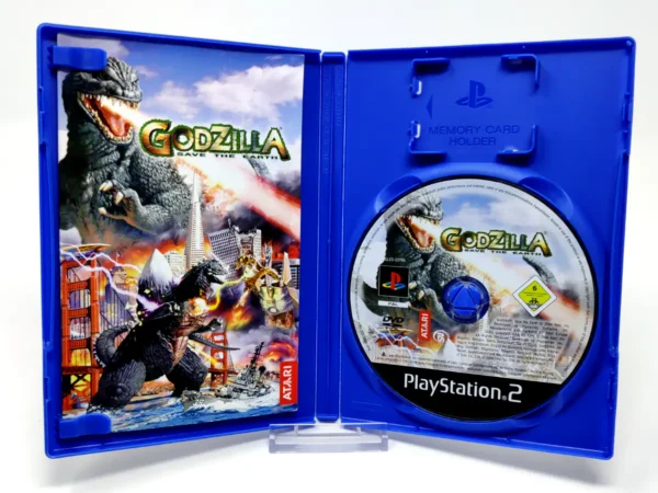 Interior del juego Godzilla: Save the Earth (ESP) para PlayStation 2 con disco y manual