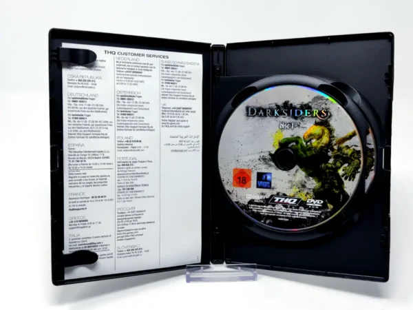Interior del juego Darksiders (ESP) para PC con disco y manual