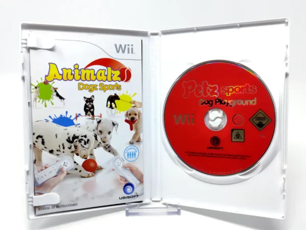 Interior del juego Animalz: Dogz Sports (ESP) para Nintendo Wii con disco y manual