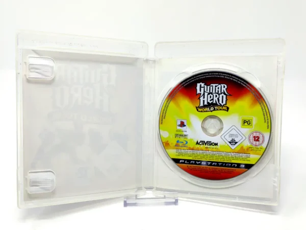 Interior del juego Guitar Hero: World Tour (EUR) (Rebajado) para PlayStation 3 con disco y manual
