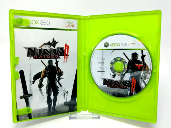 Interior del juego Ninja Gaiden II (ESP) para XBOX 360 con disco y manual