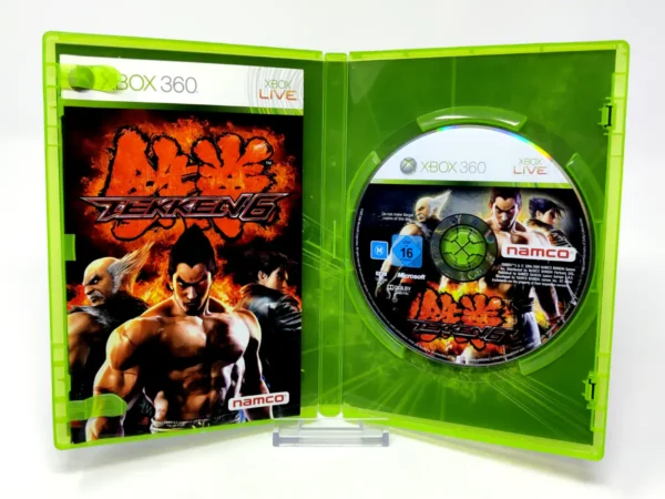 Interior del juego Tekken 6 (ESP) para XBOX 360 con disco y manual