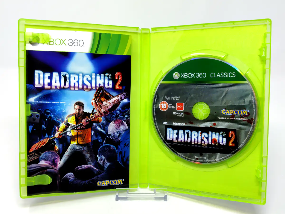 Interior del juego Dead Rising 2 (UK) (Classics) para XBOX 360 con disco y manual