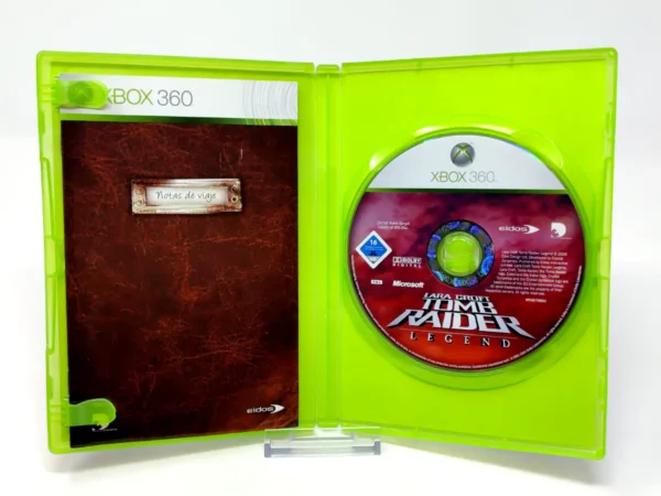 Interior del juego Tomb Raider: Legend (ESP) para XBOX 360 con disco y manual