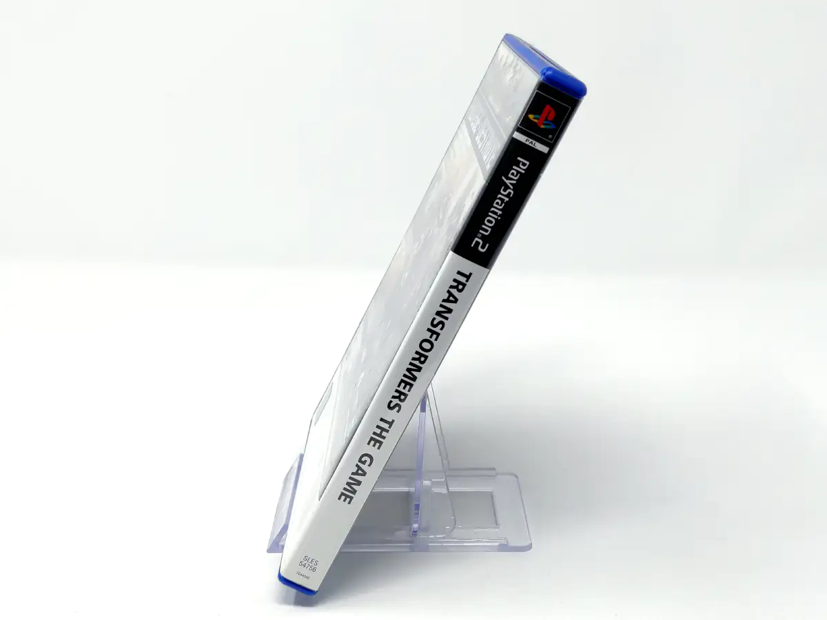 Lateral de la caja de Transformers: The Game (ESP) para PlayStation 2