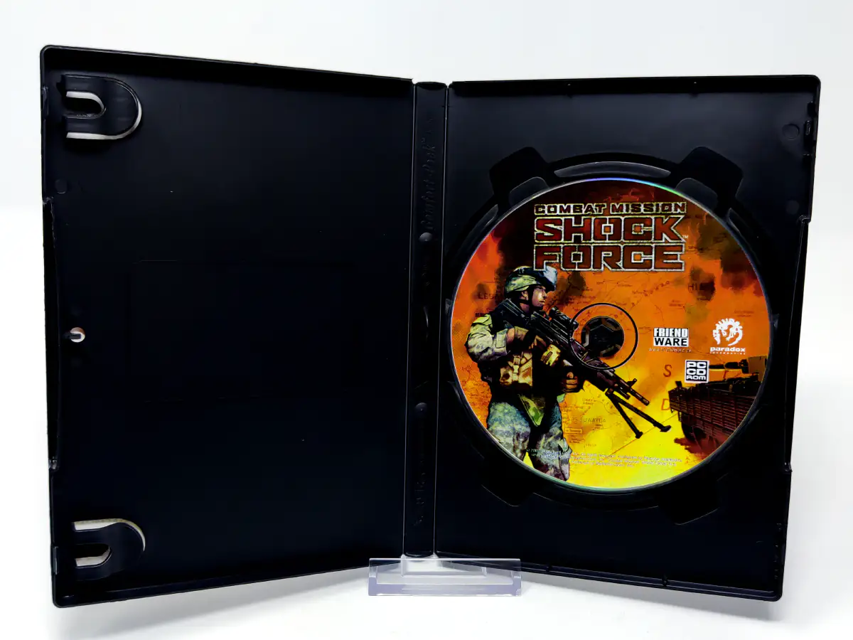 Interior del juego Combat Mission: Shock Force (ESP) para PC con disco y manual