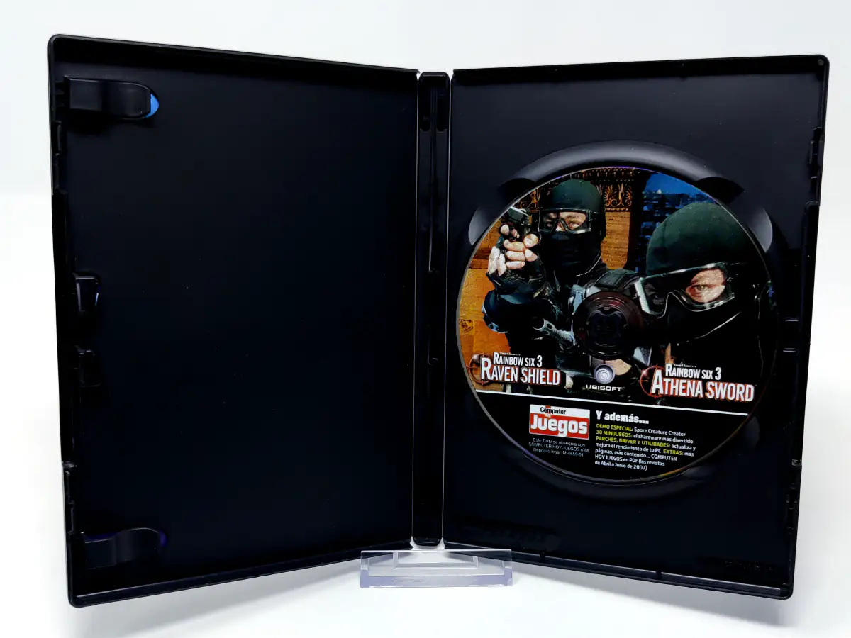 Interior del juego Tom Clancy's Rainbow Six 3: Raven Shield + Athena Sword (ESP) para PC con disco y manual