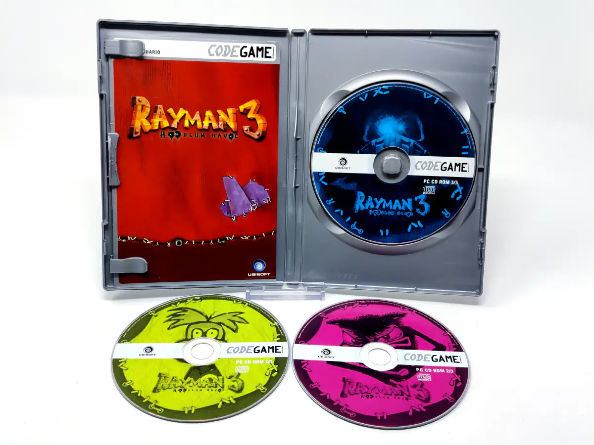Interior del juego Rayman 3: Hoodlum Havoc (ESP) para PC con disco y manual