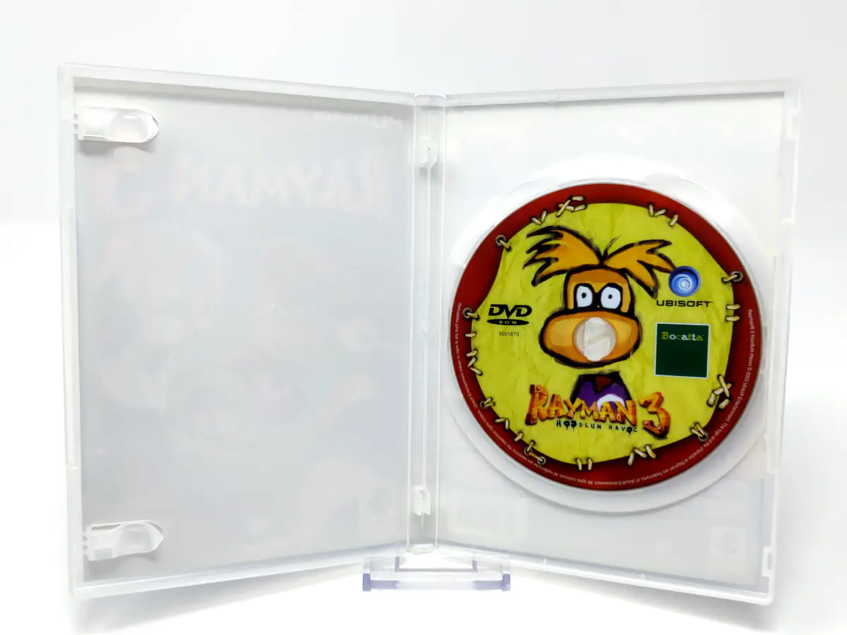 Interior del juego Rayman 3: Hoodlum Havoc (ESP) para PC con disco y manual