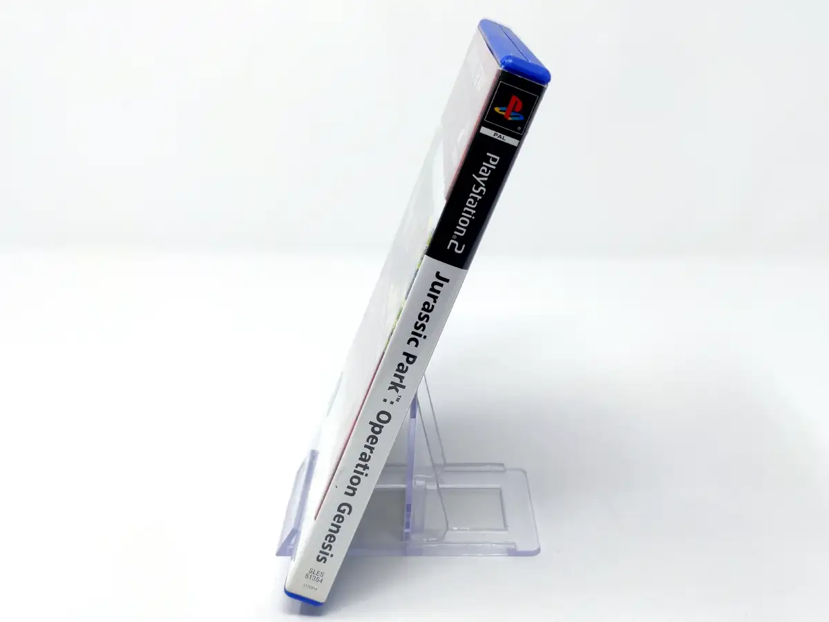 Interior del juego Jurassic Park: Operation Genesis (ESP) para PlayStation 2 con disco y manual