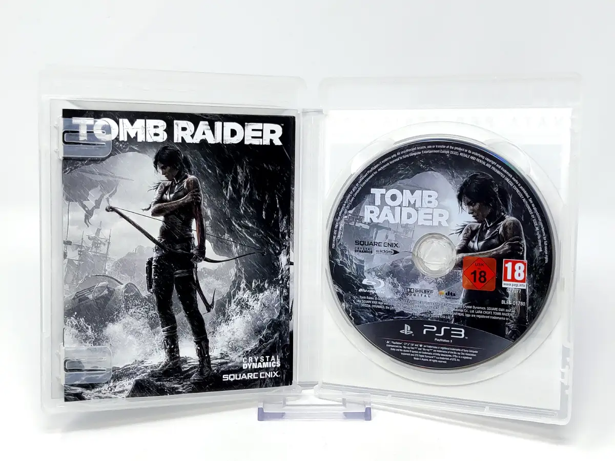 Interior del juego Tomb Raider (ITA) para PlayStation 3 con disco y manual
