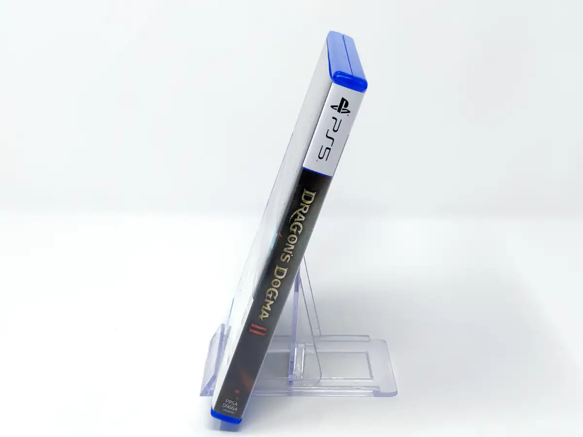 Interior del juego Dragon’s Dogma 2 (ESP) para PlayStation 5 con disco y manual