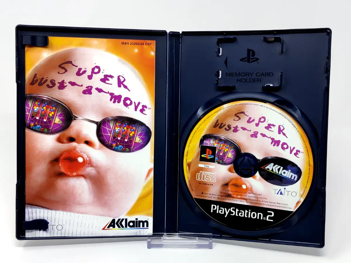 Interior del juego Space Bust-A-Move (ESP) para PlayStation 2 con disco y manual