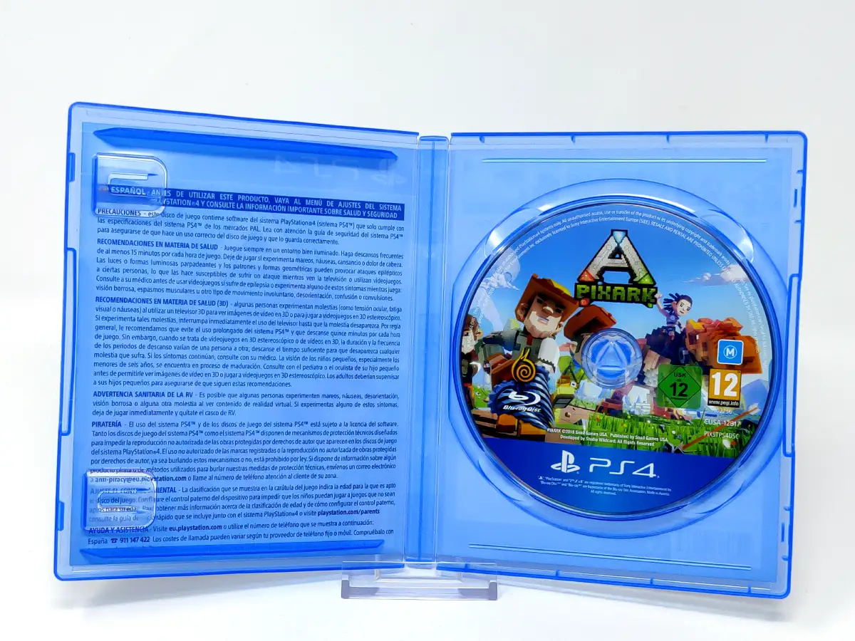 Interior del juego PixARK (ESP) para PlayStation 4 con disco y manual