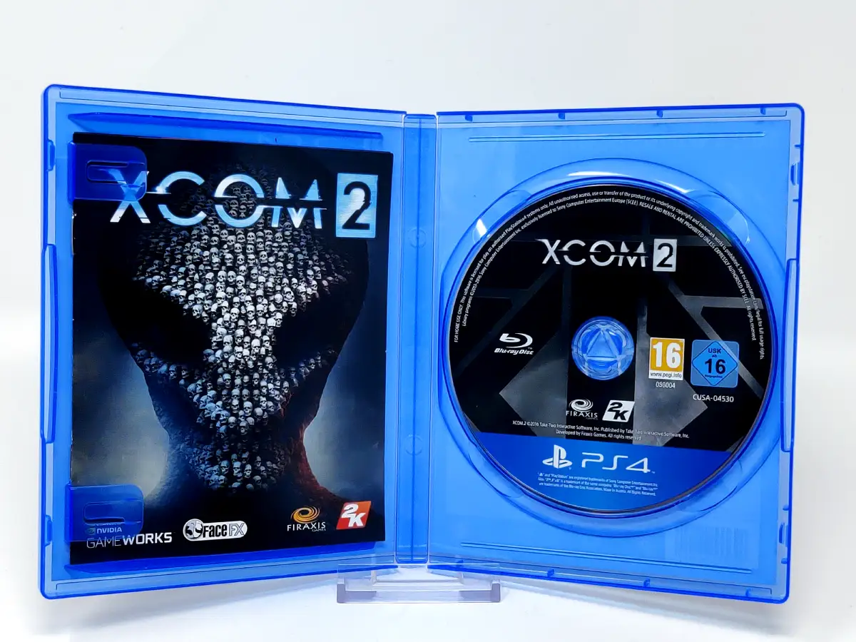 Interior del juego XCOM 2 (ESP) para PlayStation 4 con disco y manual