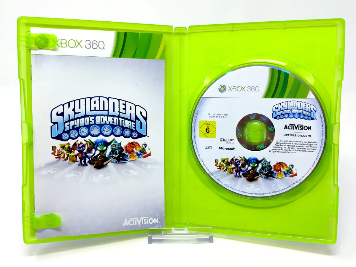 Interior del juego Skylanders Spyro's Adventure (ESP) para XBOX 360 con disco y manual