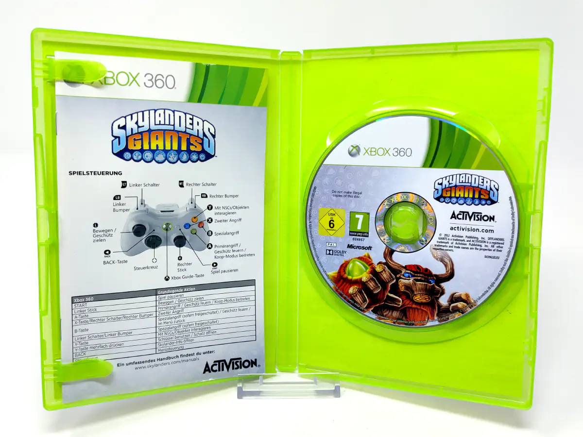 Interior del juego Skylanders Giants (ESP) para XBOX 360 con disco y manual