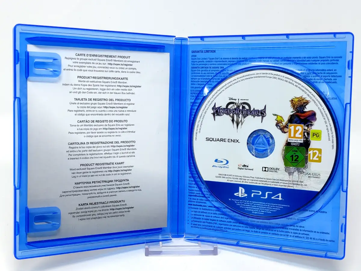 Interior del juego Kingdom Hearts III (ESP) para PlayStation 4 con disco y manual