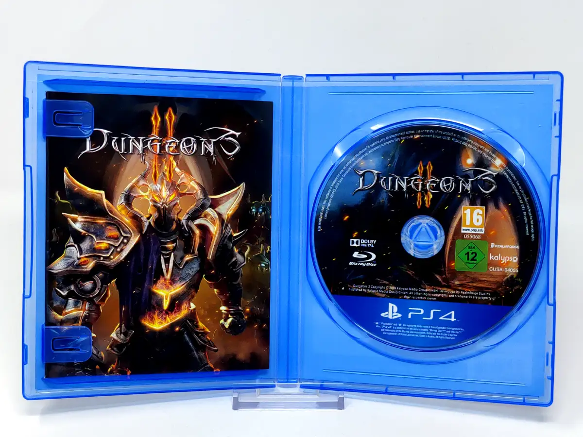 Interior del juego Dungeons II (ESP) para PlayStation 4 con disco y manual