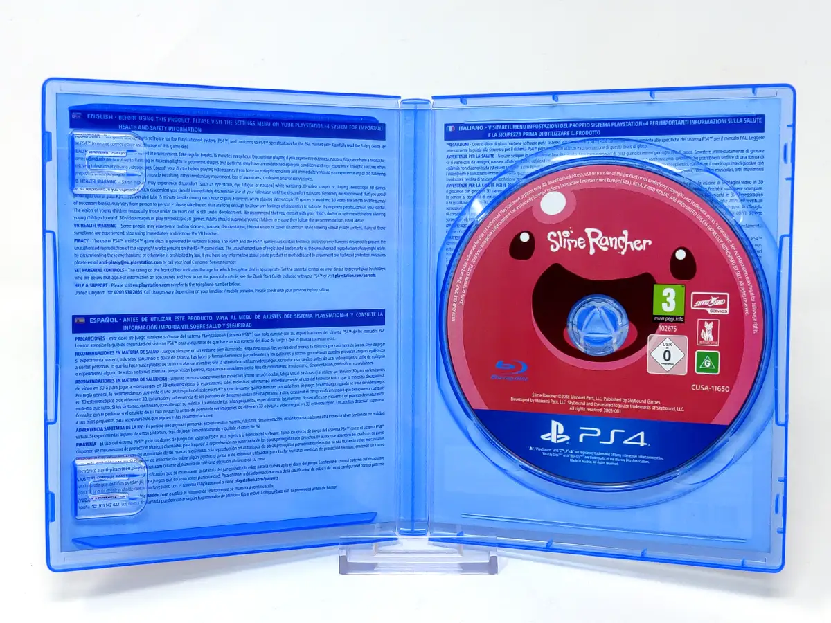 Interior del juego Slime Rancher (ESP) para PlayStation 4 con disco y manual